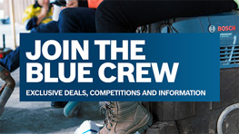 A banner reading "Join the Blue Crew" above a craft working environment.