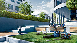 Bosch Professional lawn trimmer and leaf blower on green grass.