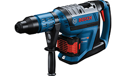 A blue Bosch Professional hammer drill lies on a white background.