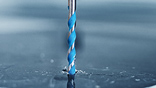 A blue Bosch Professional drill penetrates a metal surface.
