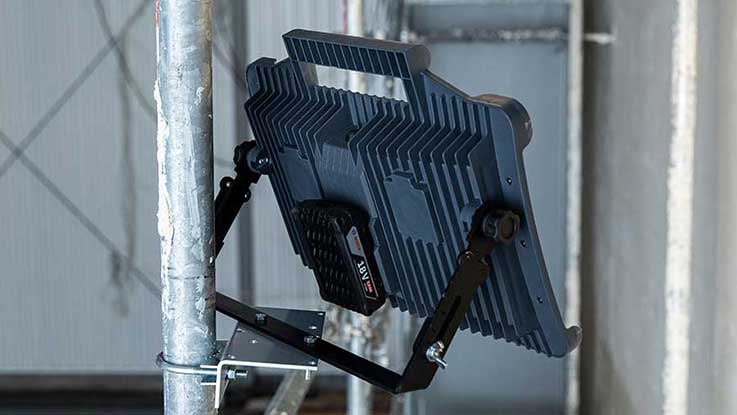 Black Bosch Professional LED light mounted on a scaffold.