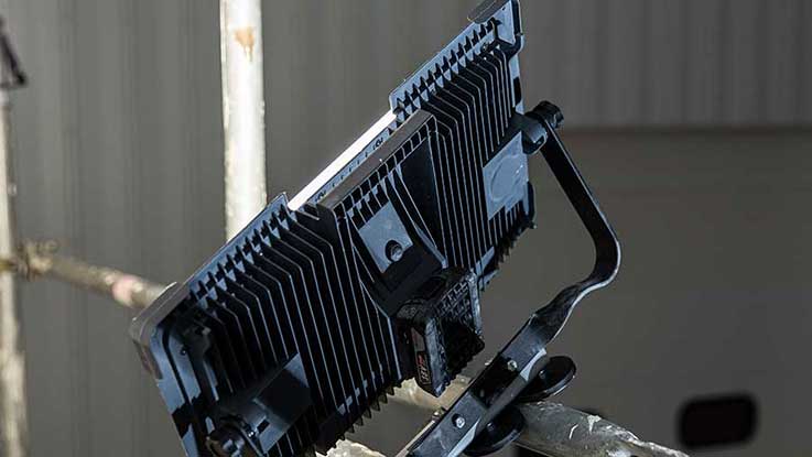 A black Bosch Professional tool mounted on a scaffold.