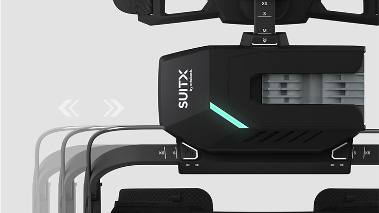 Black SUITX holder with blue LED display on a light background.