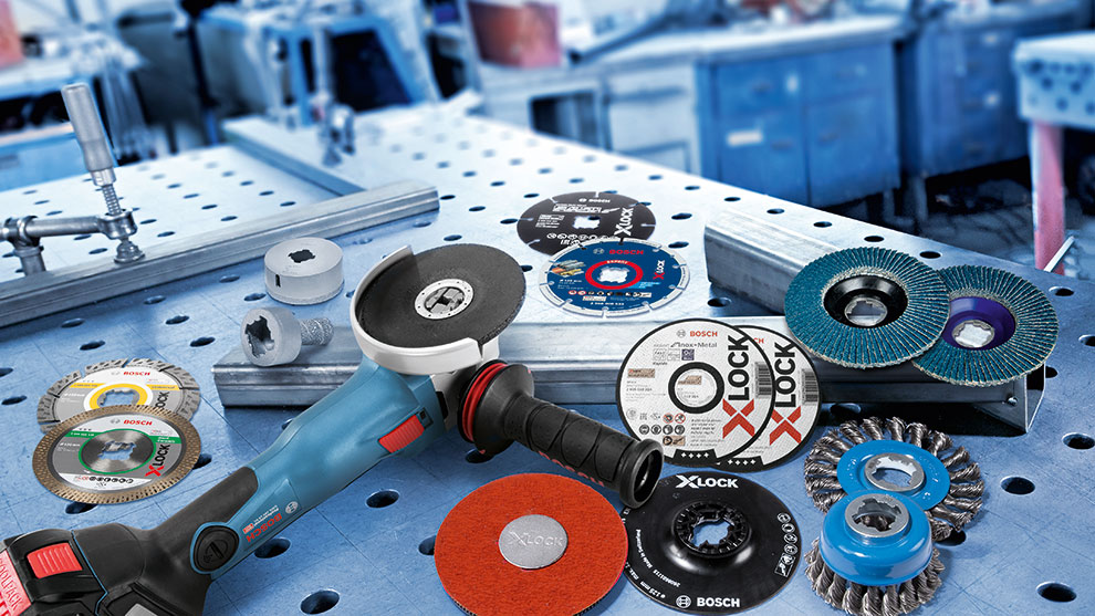 X-LOCK PRODUCTS Bosch Professional cordless angle grinder with various grinding and cutting discs.